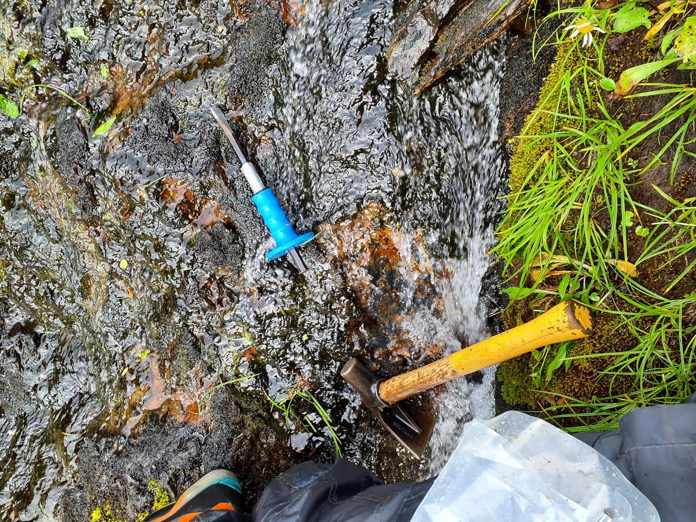 Sampling a mineralized vein on the Georgia Project